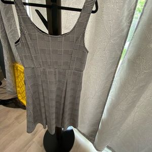 Brand new with tags. Torrid size 1. AC BLK/plaid sl scuba skater .